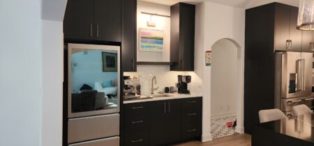 black cabinets in bar area in kitchen by Crosby Fine Cabinetry Belle Plaine MN