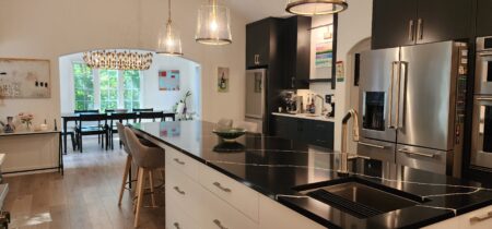 white island with black perimeter cabinetry by Crosby Fine Cabinetry Belle Plaine MN