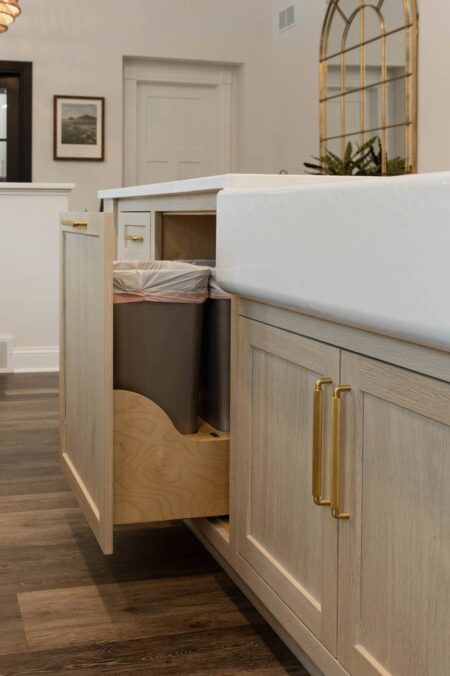 custom trash rollout large island by Crosby Fine Cabinetry Belle Plaine MN