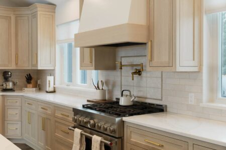 two toned white oak accented hood by Crosby Fine Cabinetry Belle Plaine MN