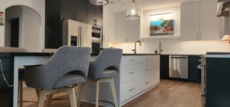 white painted island with seating by Crosby Fine Cabinetry Belle Plaine MN