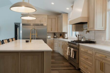 inset cabinetry with two toned hood in prior lake minnesota by Crosby Fine Cabinetry Belle Plaine MN