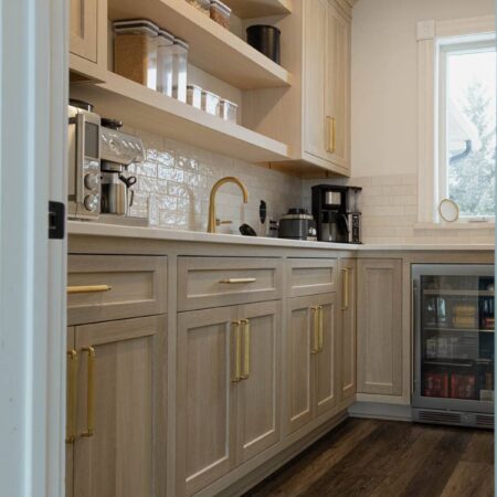 rift white oak pantry cabinets with floating shelves by Crosby Fine Cabinetry Belle Plaine MN